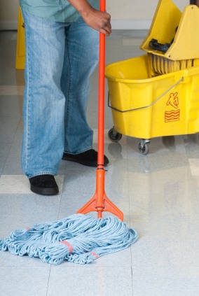 Clean and Honest Commercial Cleaning janitor in Stonersville, PA mopping floor.